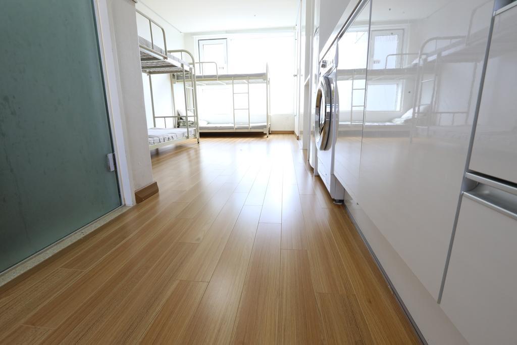 Phil House Albergue Guri Habitación foto