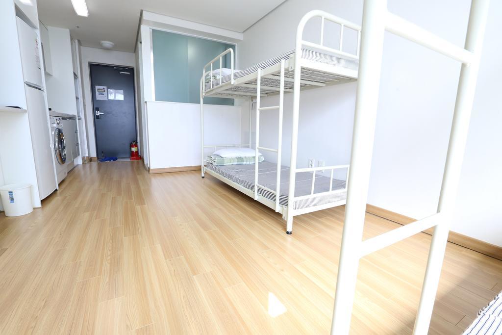 Phil House Albergue Guri Habitación foto