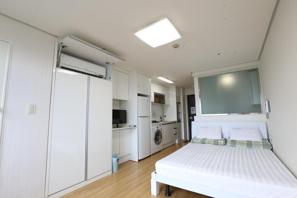 Phil House Albergue Guri Habitación foto