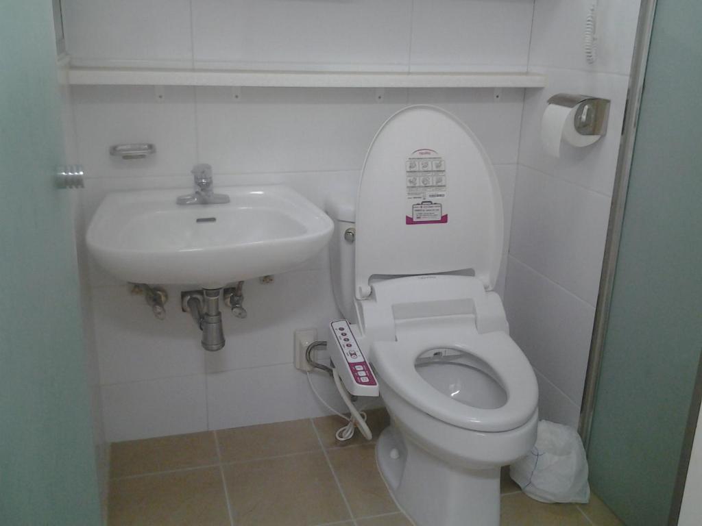 Phil House Albergue Guri Habitación foto
